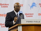 General Manager Martin Mayhew of the Detroit Lions introduces Jim Caldwell as the Lions head coach during a news conference at Ford Field on January 15, 2014