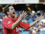 Liverpool's Michael Owen celebrates scoring his team's third goal against Leeds during their Premiership clash at Elland Road in Leeds on 3 February 2002