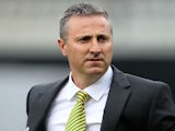 Neil Adams manager of Norwich City looks on prior to the Barclays Premier League match between Fulham and Norwich City at Craven Cottage on April 12, 2014