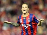 Adam Taggart of the Jets celebrates a goal during the round 27 A-League match between the Newcastle Jets and Adelaide United at Hunter Stadium on April 11, 2014