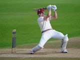 Nick Compton of Somerset smashes the ball to the boundary during day three of the LV County Championship division one match between Nottinghamshire and Somerset at Trent Bridge on September 26, 2013