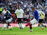 Kevin-Prince Boateng of Portsmouth scores from the penalty spot during the FA Cup sponsored by E.ON Semi Final match between Tottenham Hotspur and Portsmouth at Wembley Stadium on April 11, 2010
