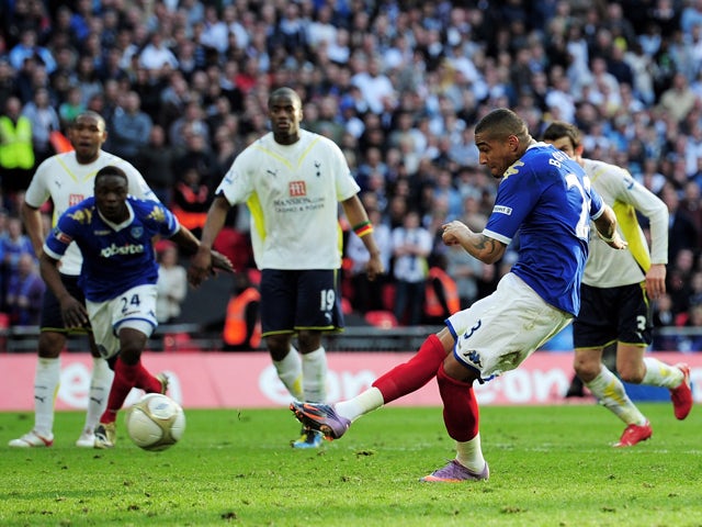 Kevin-Prince Boateng of Portsmouth scores from the penalty spot during the FA Cup sponsored by E.ON Semi Final match between Tottenham Hotspur and Portsmouth at Wembley Stadium on April 11, 2010
