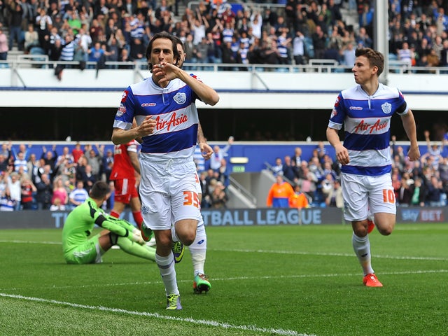Yossi Benayoun of Queens Park Rangers celebrates scoring the 1st goal during the Sky Bet Championship match between Queens Park Rangers and Nottingham Forest at Loftus Road on April 12, 2014