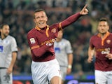 Roma's Rodriguo Taddei celebrates after scoring the opening goal against Atalanta during the Serie A match on April 12, 2014