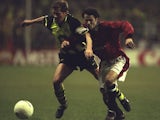 Manchester United's Ryan Giggs battles for possession against Borussia Dortmund on April 09, 1997.