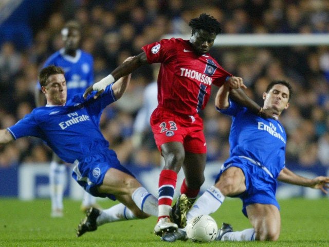 Scott Parker and Frank Lampard attempt to win back possession for Chelsea against Paris Saint-Germain on November 24, 2004.