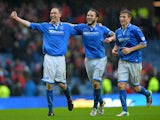 St Johnstone's Steven Anderson, Steven May and David Wotherspoon celebrates at the final whistle after beating Aberdeen in the Scottish Cup semi final on April 13, 2014