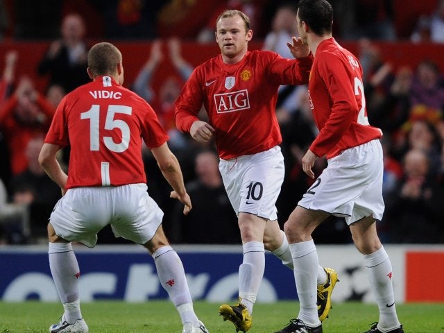 Wayne Rooney celebrates his goal for Manchester United against Porto on April 07, 2009.