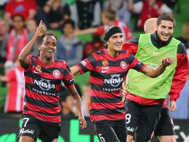 Youssouf Hersi of the Wanderers celebrates after scoring the match winning goal during the round 27 A-League match between Melbourne Heart and the Western Sydney Wanderers at AAMI Park on April 12, 2014