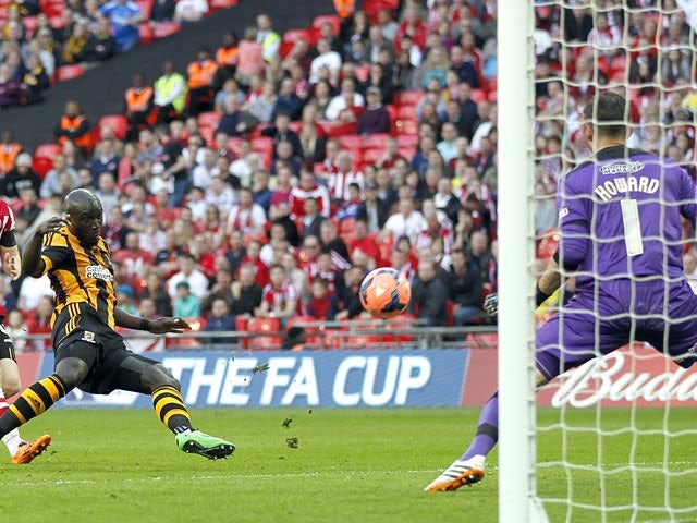 Hull's Yannick Sagbo scores his team's first goal against Sheffield United during the FA Cup semi final match on April 13, 2014