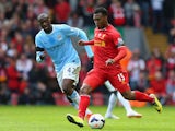 Liverpool's Daniel Sturridge and Manchester City's Yaya Toure in action during the Premier League match on April 13, 2014