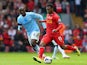 Liverpool's Daniel Sturridge and Manchester City's Yaya Toure in action during the Premier League match on April 13, 2014