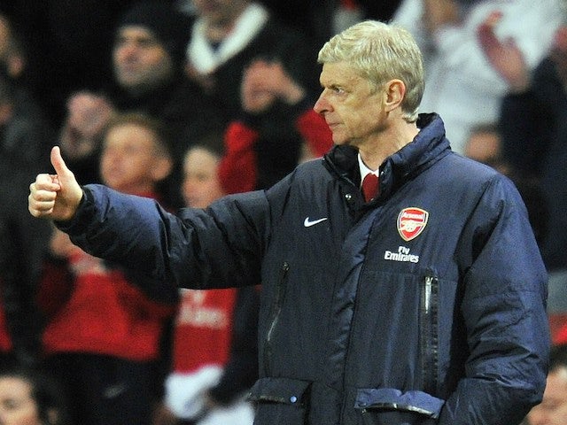 Arsenal's French manager Arsene Wenger gestures during the English Premier League football match between Arsenal and West Ham United at the Emirates Stadium in London on April 15, 2014