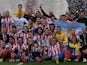 Atletico Madrid players celebrate winning the Copa del Rey against Real Madrid on May 17, 2013.
