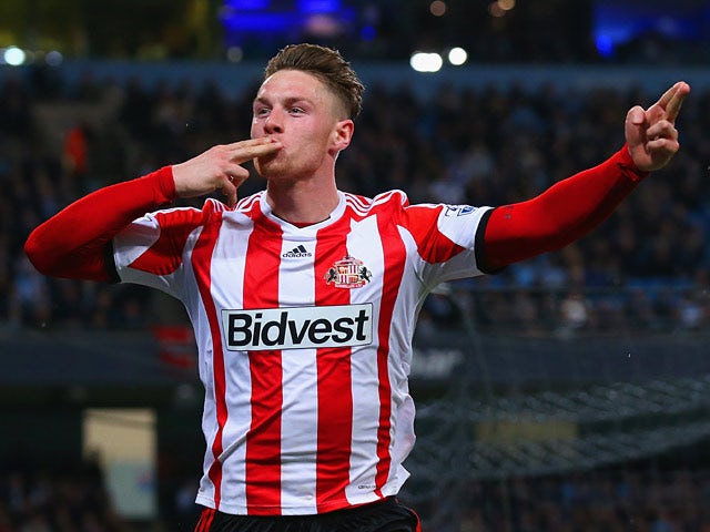 Sunderland's Connor Wickham celebrates after scoring his team's first goal against Manchester City during the Premier League match on April 16, 2014