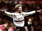 David Beckham, then of Manchester United, celebrates scoring against Arsenal on April 14, 1999.