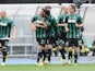 Sassuolo's Domenico Berardi is congratulated by teammates after scoring the opening goal against Chievo Verona during the Serie A match on April 19, 2014