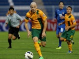  Dylan Tombides of Australia in action during the AFC U-22 Championship Group C match between Australia and Kuwait at Royal Oman Police Stadium on January 12, 2014
