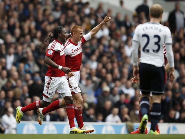 Fulham's English midfielder Steve Sidwell celebrates scoring their first goal to equalise during the English Premier League football match between Tottenham Hotspur and Fulham at White Hart Lane in north London on April 19, 2014