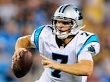 Jimmy Clausen #7 of the Carolina Panthers in action against Pittsburgh Steelers during a preseason NFL game on August 29, 2013