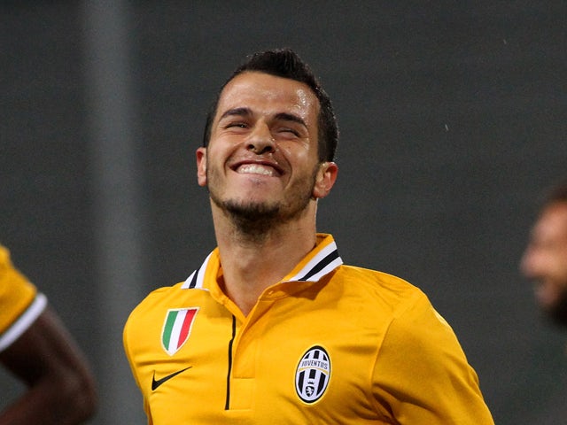 Sebastian Giovinco of Juventus celebrates after scores his opening goa during the Serie A match between Udinese Calcio and Juventus at Stadio Friuli on April 14, 2014