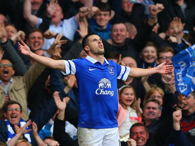 Kevin Mirallas of Everton celebrates scoring their second goal during the Barclays Premier League match against Manchester United on April 20, 2014