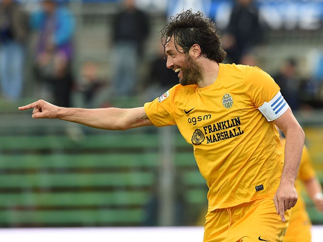 Hellas Verona's Luca Toni celebrates after scoring his team's second goal against Atalanta during the Serie A match on April 19, 2014