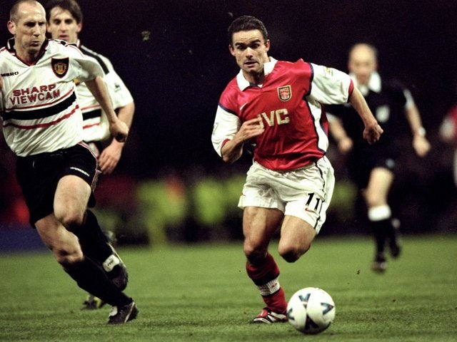 Marc Overmars, then of Arsenal, in possession of the ball against Manchester United on April 14, 1999.