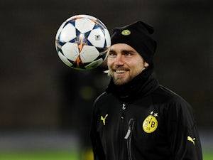 Team News: Schmelzer back in for Dortmund