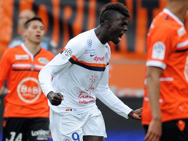 Montpellier's French forward Mbaye Niang celebrates after scoring a goal during the French L1 football match between Lorient and Montpellier on April 20, 2014