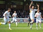 Chris Zebroski of Newport County celebrates scoring the first goal during the Sky Bet League Two match between AFC Wimbledon and Newport County at The Cherry Red Records Stadium on April 18, 2014