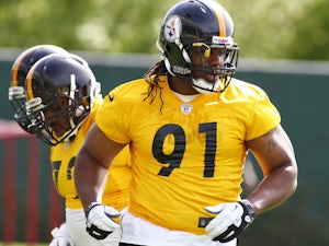 Nick Williams #91 of the Pittsburgh Steelers participates in drills during Rookie Camp on May 3, 2013