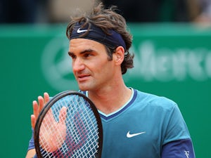 Federer gives Switzerland perfect start