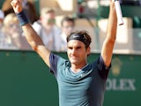 Roger Federer celebrates after beating Novak Djokovic during the Monte Carlo Masters match on April 19, 2014n