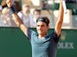 Roger Federer celebrates after beating Novak Djokovic during the Monte Carlo Masters match on April 19, 2014n