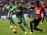 Saint-Etienne's French midfielder Romain Hamouma challenges Rennes' Tiemoue Bakayoko during the French L1 football match between Saint-Etienne and Rennes at the Geoffroy Guichard stadium in Saint-Etienne, central France, on April 18, 2014