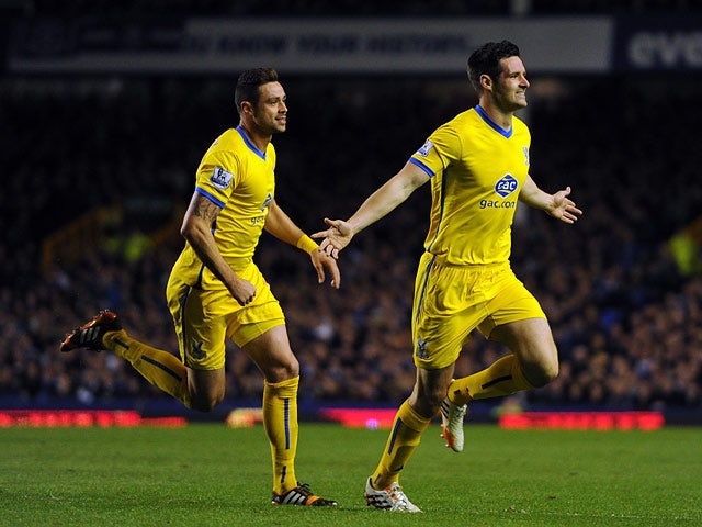 Crystal Palace's Scott Dann celebrates after scoring his team's second goal against Everton during the Premier League match on April 16, 2014