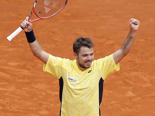 Stanislas Wawrinka celebrates after beating David Ferrer during the Monte Carlo Masters match on April 19, 2014