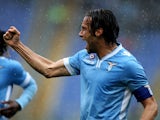 Lazio's Stefano Mauri celebrates after scoring the opening goal against Torino during the Serie A match on April 19, 2014
