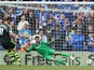 David Marshall the goalkeeper of Cardiff City dives the wrong way as Marko Arnautovic of Stoke City scores the opening goal from a penalty during the Barclays Premier League match between Cardiff City and Stoke City at the Cardiff City Stadium on April 19
