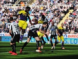 Wilfried Bony of Swansea City rises to score their first goal with a header during the Barclays Premier League match between Newcastle United and Swansea City at St James' Park on April 19, 2014