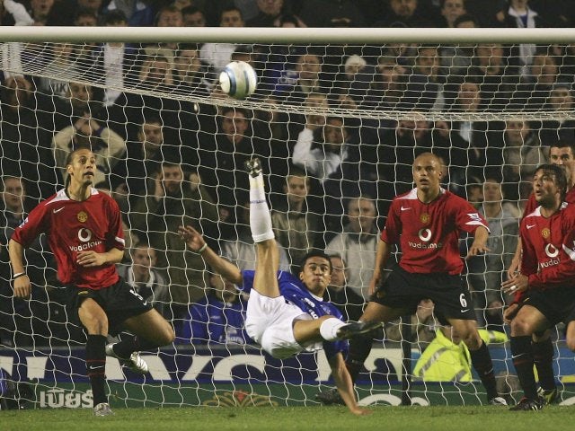 Tim Cahill, then of Everton, attempts to score with an overhead kick against Manchester United on April 20, 2005.