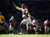 London Wasps' Tom Varndell goes on to score a try against Gloucester during the Aviva Premiership match on April 19, 2014