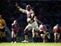 London Wasps' Tom Varndell goes on to score a try against Gloucester during the Aviva Premiership match on April 19, 2014
