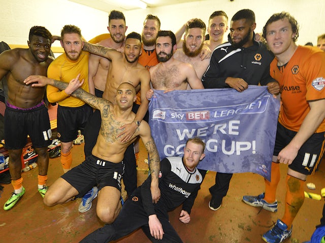 Wolverhampton Wanderers players celebrate their promotion to the Championship on April 12, 2014