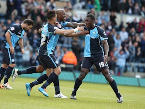 Wycombe win FA Cup battle with Barnet