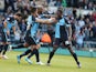 Aaron Pierre of Wycombe Wanderers celebrates with team mates after scoring his sides 1st goal during the Sky Bet League Two match between Wycombe Wanderers and Northampton Town at Adams Park on April 18, 2014