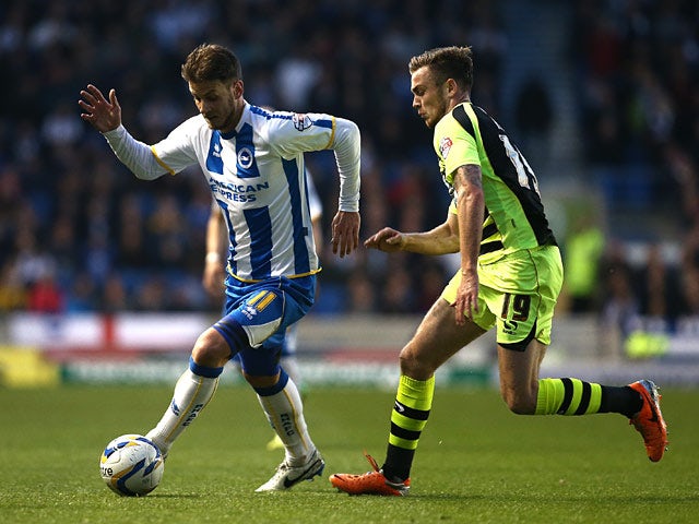 Brighton's Andrea Orlandi and Yeovil's Joe Ralls in action during the Championship match on April 25, 2014