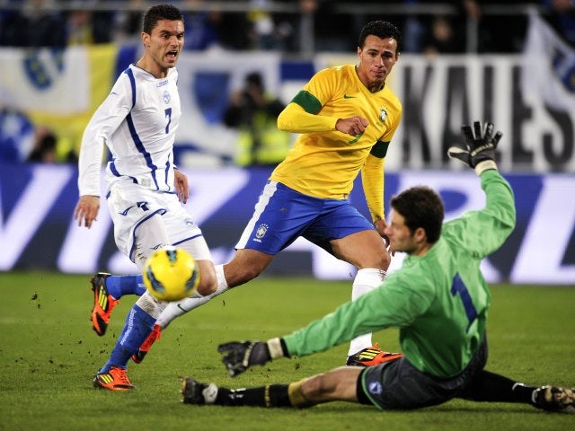 Bosnia goalkeeper Asmir Begovic makes a save against Brazil on February 28, 2012.